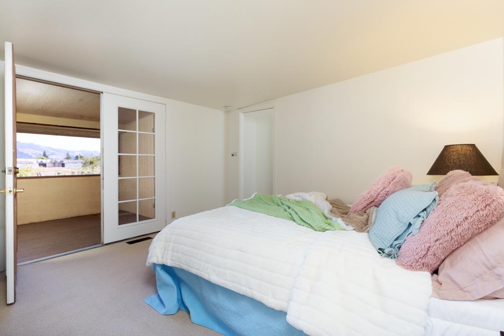 96 Wheelock Road Watsonville, CA 95076 - Photo 17 of 53 a bedroom with a bed and cabinet