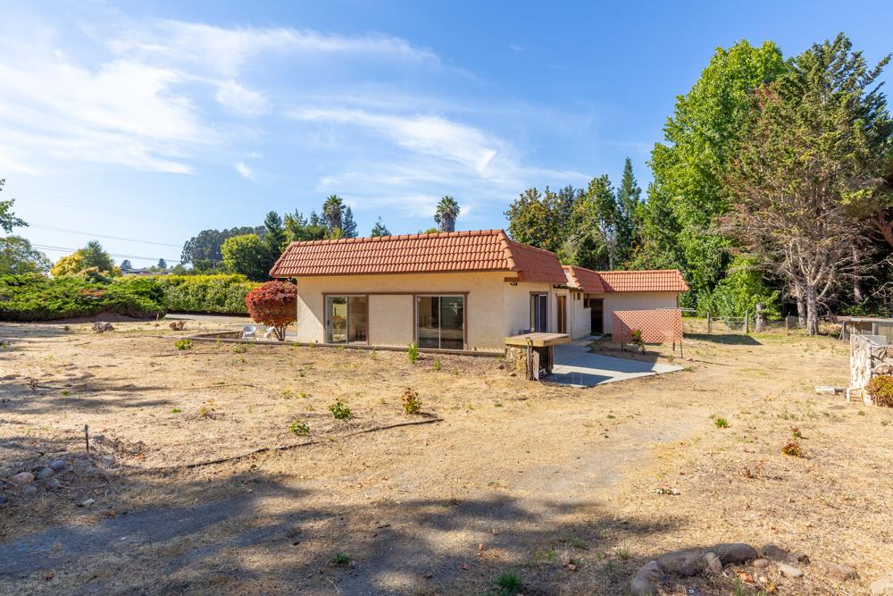 96 Wheelock Road Watsonville, CA 95076 - Photo 24 of 53 a view of a house with backyard and sitting area