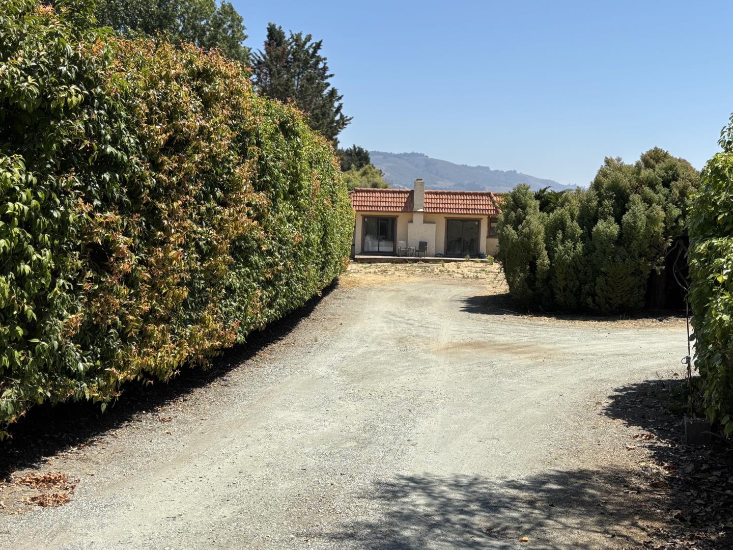 96 Wheelock Road Watsonville, CA 95076 - Photo 3 of 53 a view of a house with a yard