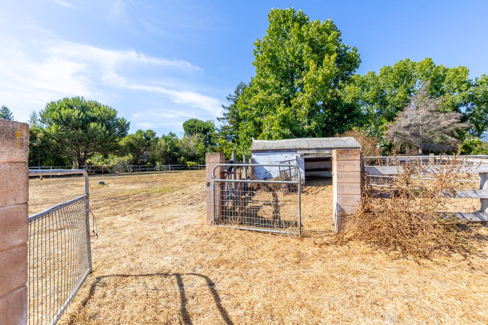 96 Wheelock Road Watsonville, CA 95076 - Photo 32 of 53 a view of a terrace with a bench