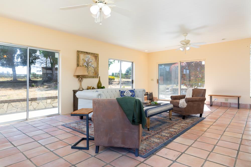 96 Wheelock Road Watsonville, CA 95076 - Photo 9 of 53 a living room with furniture and a large window