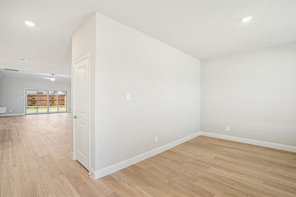 2621 Grand Cyn Street Anna, TX 75409 - Photo 14 of 37 wooden floor in an empty room