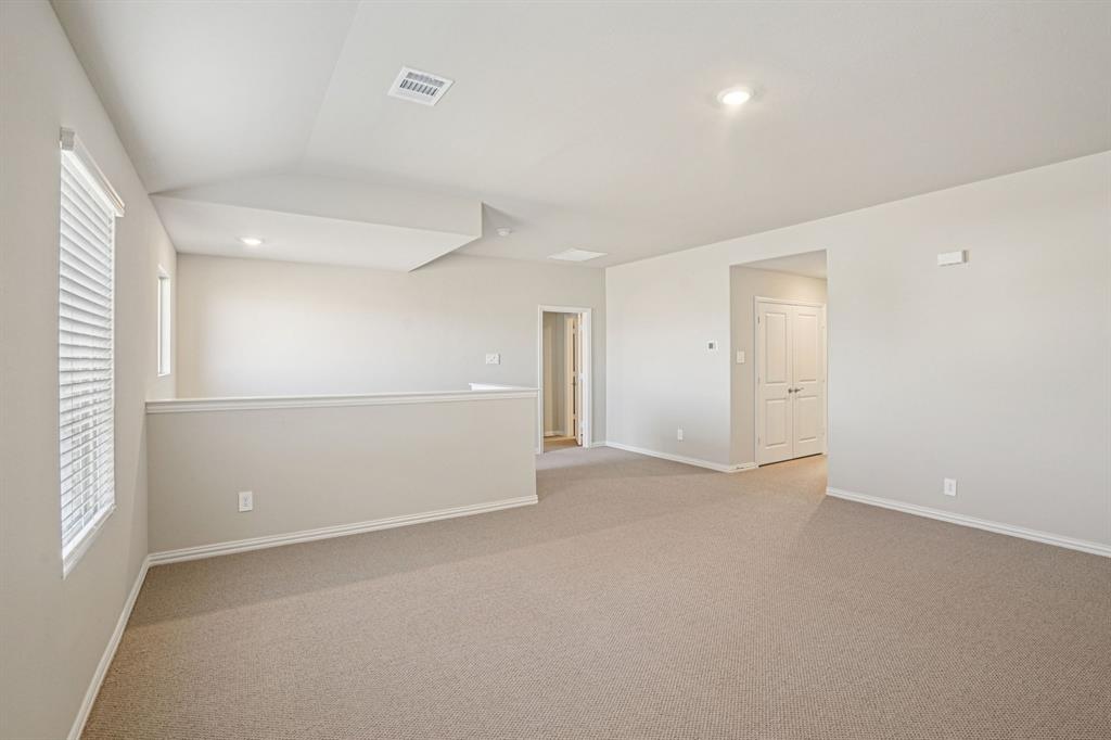 2621 Grand Cyn Street Anna, TX 75409 - Photo 25 of 37 an empty room with a empty space and windows