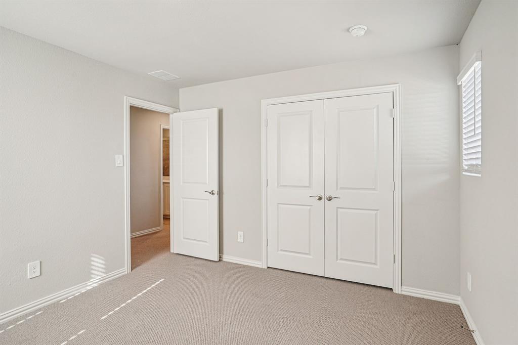 2621 Grand Cyn Street Anna, TX 75409 - Photo 31 of 37 an empty room with closet area