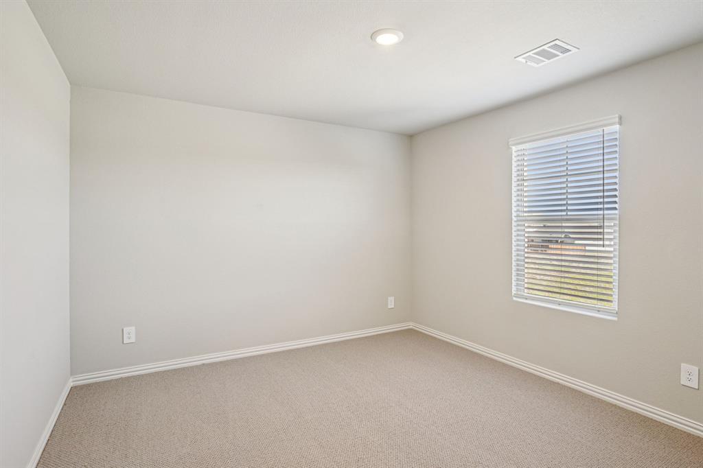 2621 Grand Cyn Street Anna, TX 75409 - Photo 32 of 37 an empty room with a window