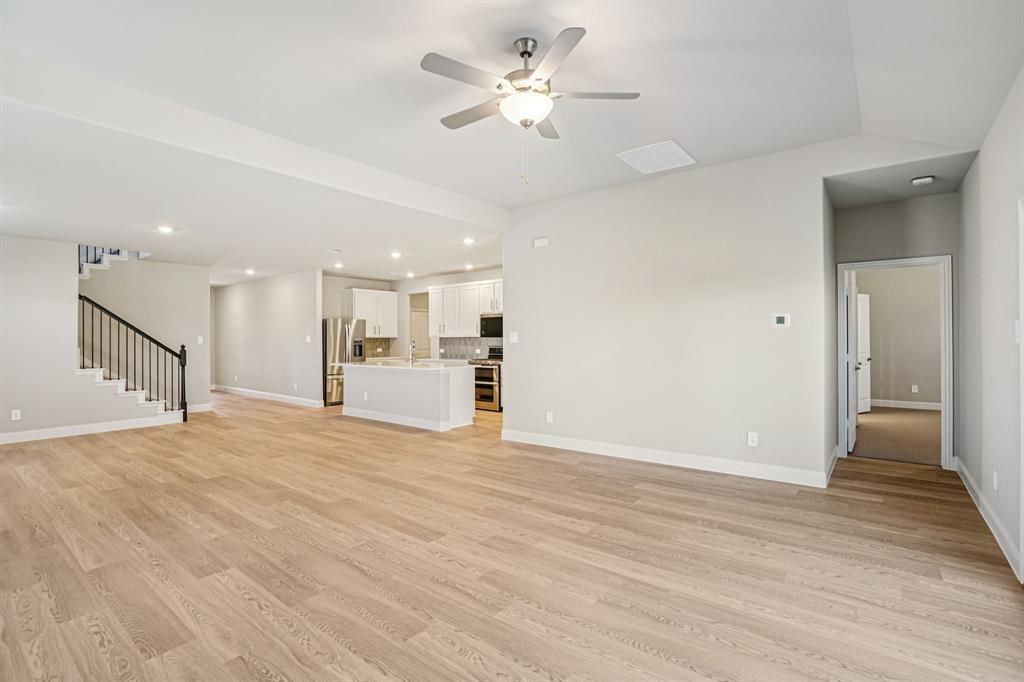 2621 Grand Cyn Street Anna, TX 75409 - Photo 10 of 37 a view of an empty room and kitchen view