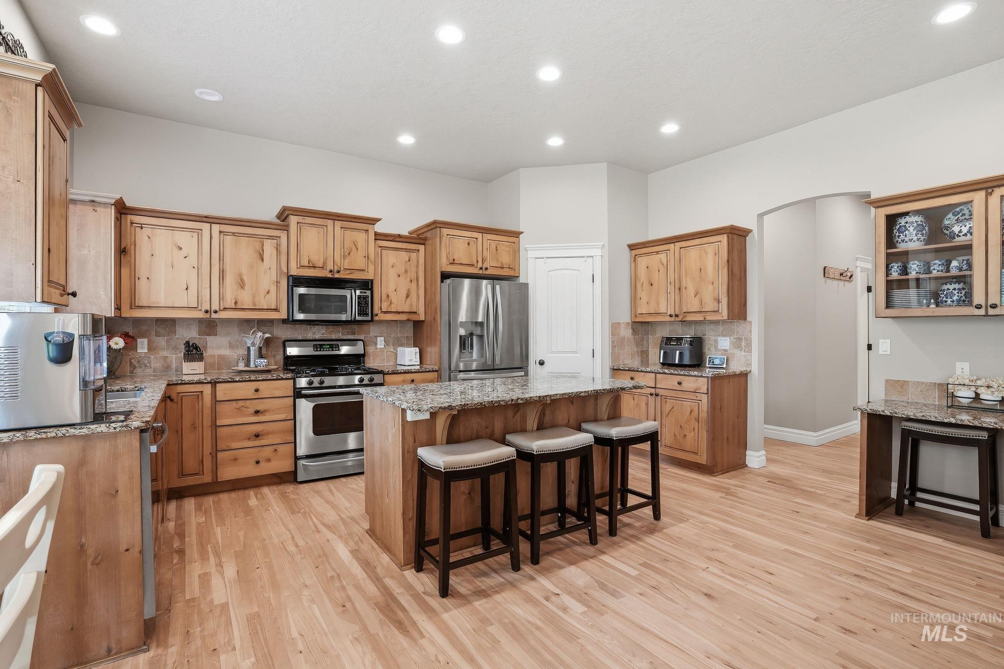 3969 North Hollymount Way Meridian, ID 83646 - Photo 15 of 47 Spacious kitchen featuring wood-finish flooring and ample cabinetry