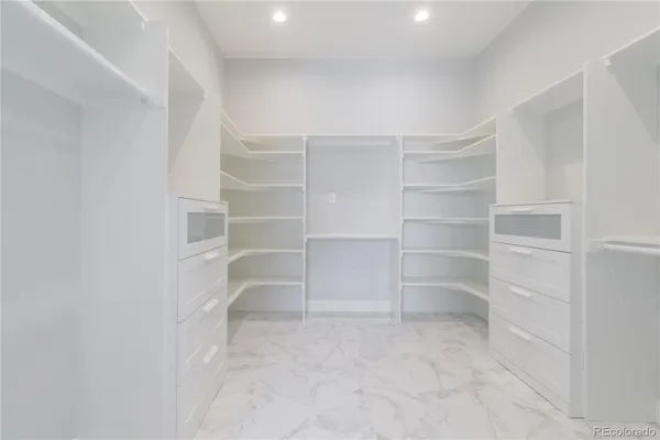 a view of an empty walk in closet