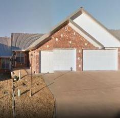 1813 Riverstone Lane Longview, TX 75605 - Photo 1 of 1 View of front of home featuring concrete driveway, a garage, and brick siding