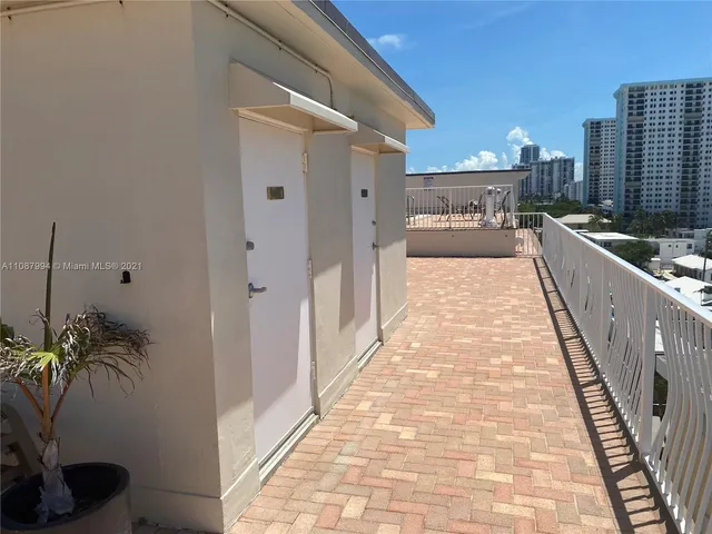 a view of a balcony with an ocean view