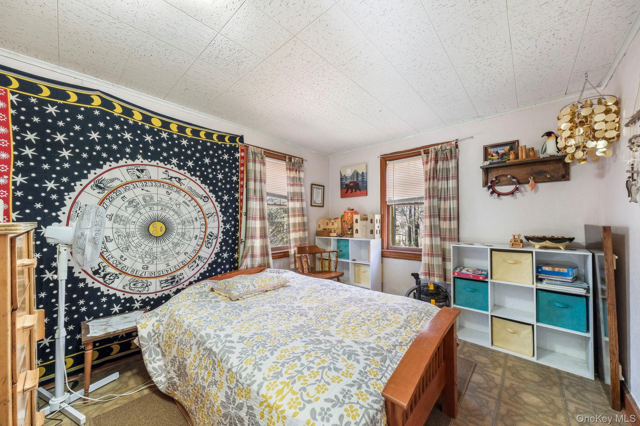 184 Yankee Lake Road Wurtsboro, NY 12790 - Photo 11 of 27 Bedroom featuring tile patterned floors