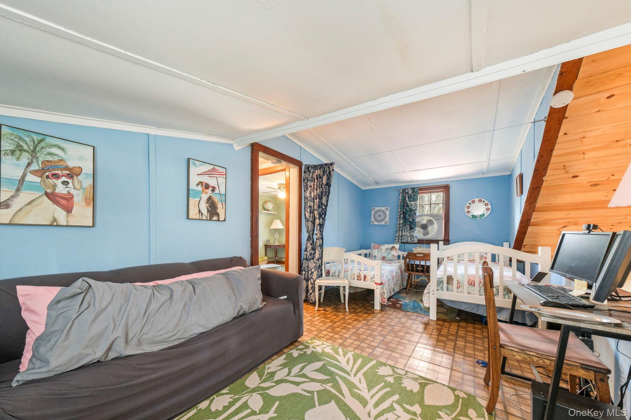 184 Yankee Lake Road Wurtsboro, NY 12790 - Photo 16 of 27 Bedroom featuring tile patterned floors