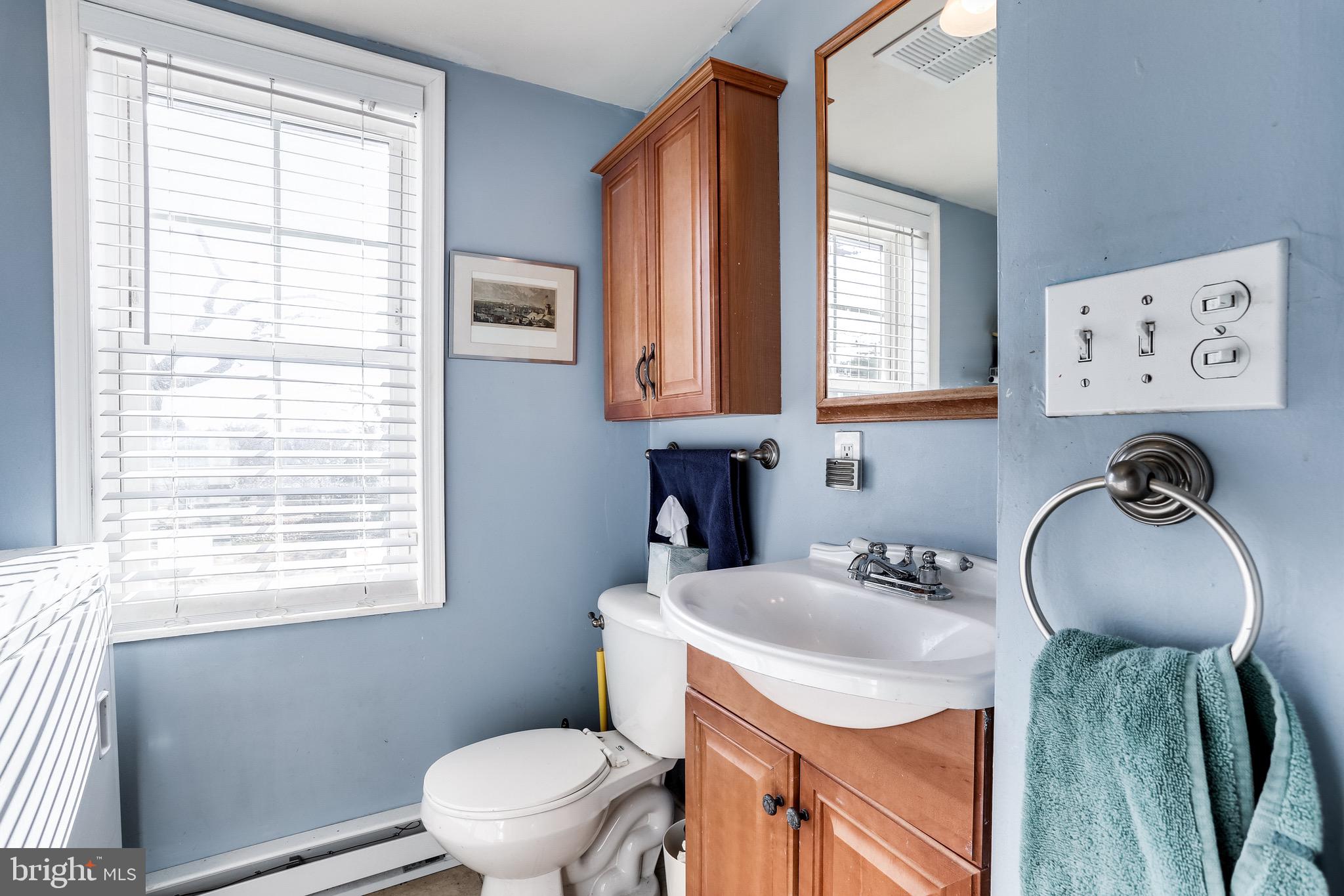 4317 Harcourt Road Baltimore, MD 21214 - Photo 13 of 35 Half bath and laundry on main level