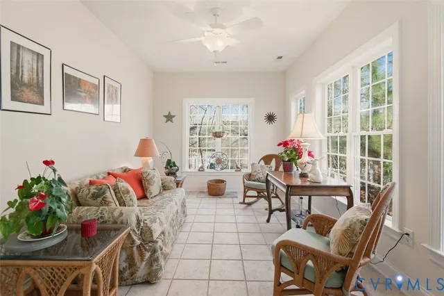 a kitchen with a sink cabinets and a wooden floor