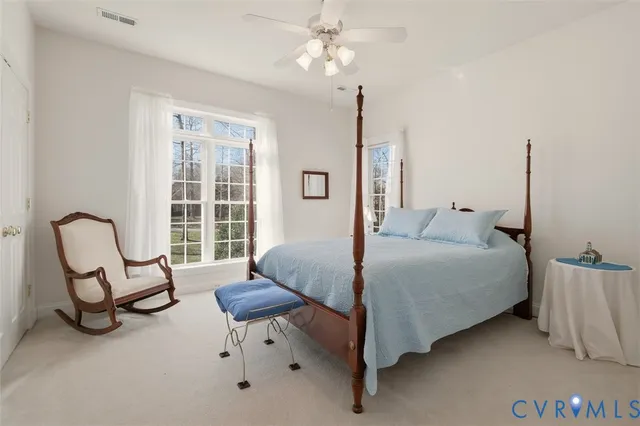 a room with furniture and flat screen tv