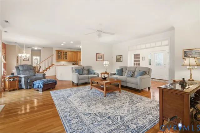 a view of a dining room with furniture and a potted plant