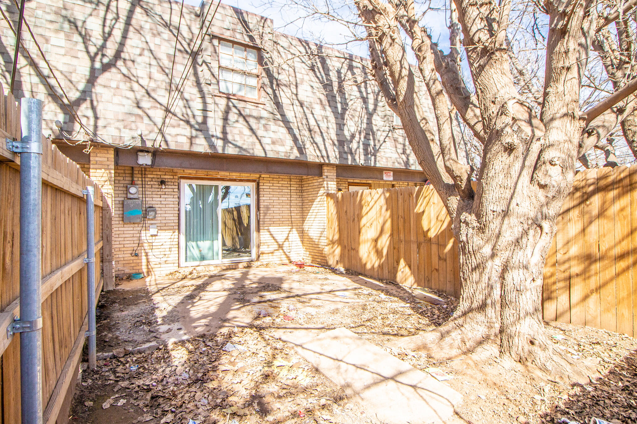 2105 49th Street Lubbock, TX 79412 - Photo 17 of 31 a view of a house with a snow in the yard
