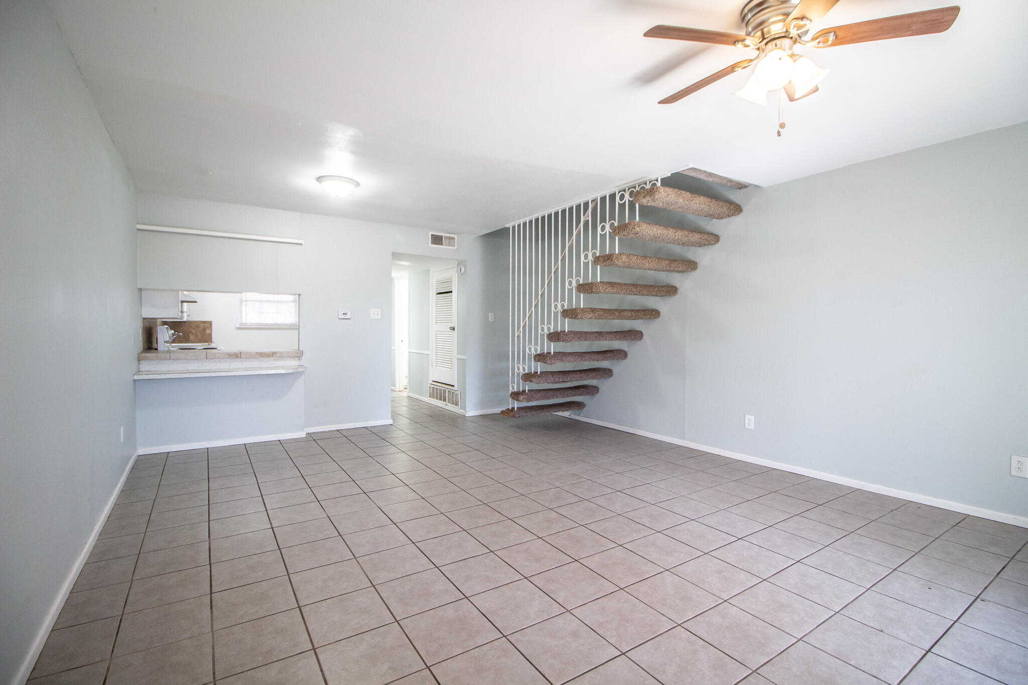 2105 49th Street Lubbock, TX 79412 - Photo 3 of 31 a view of an empty room with a window