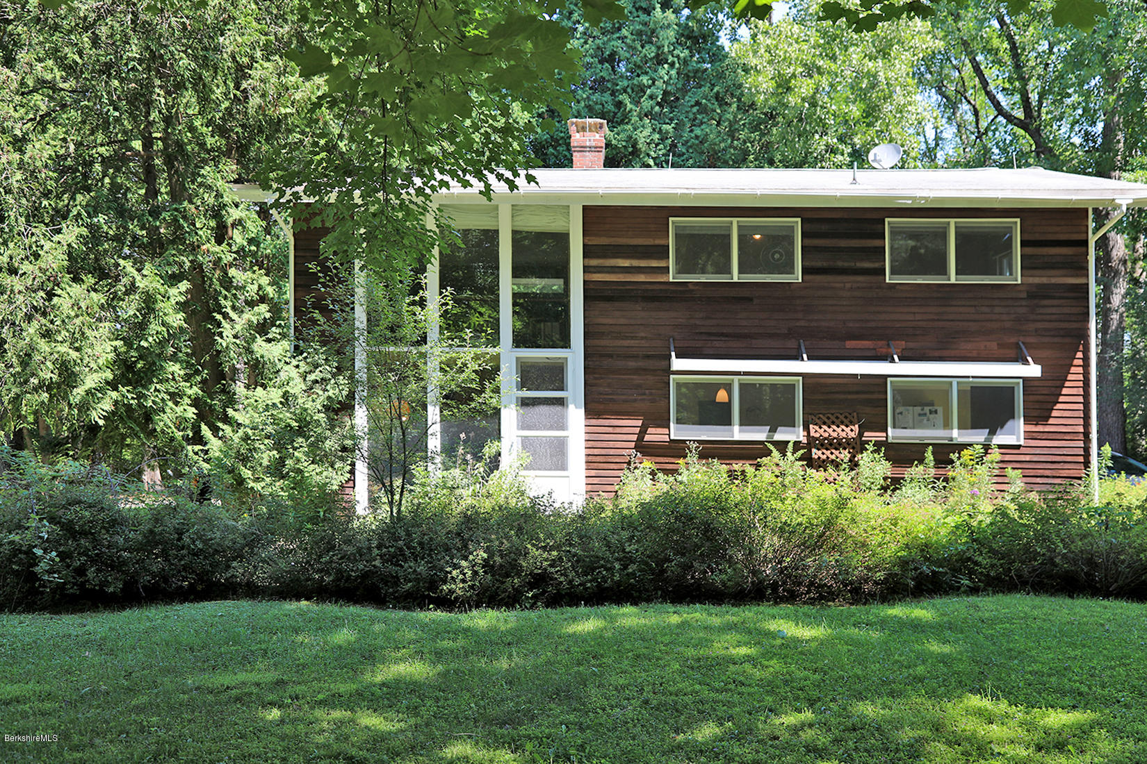 13 Hill Road Stockbridge, MA 01262 - Photo 2 of 27 a house view with a garden space