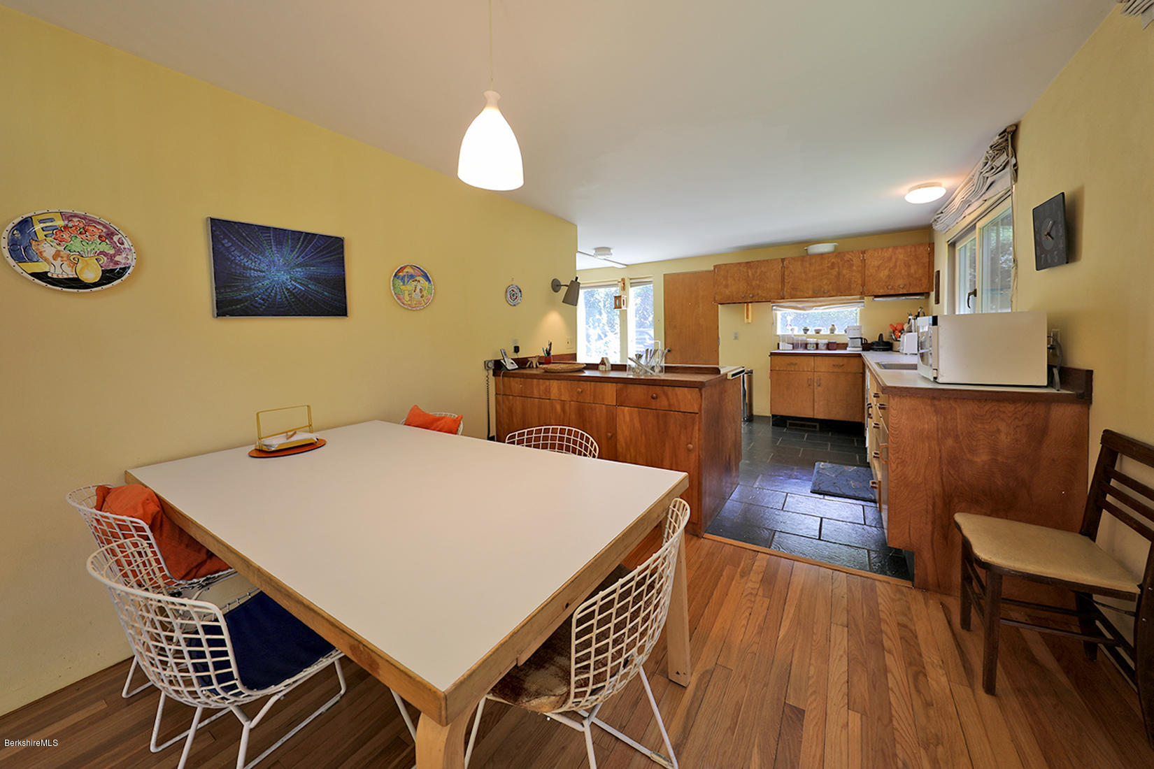 13 Hill Road Stockbridge, MA 01262 - Photo 11 of 27 a view of a dining room with furniture and wooden floor