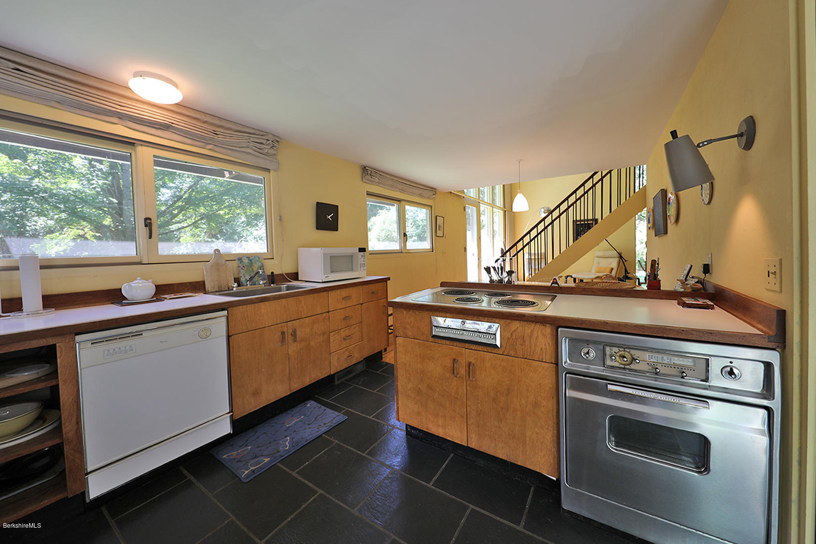 13 Hill Road Stockbridge, MA 01262 - Photo 12 of 27 a kitchen with stainless steel appliances granite countertop a sink and a stove