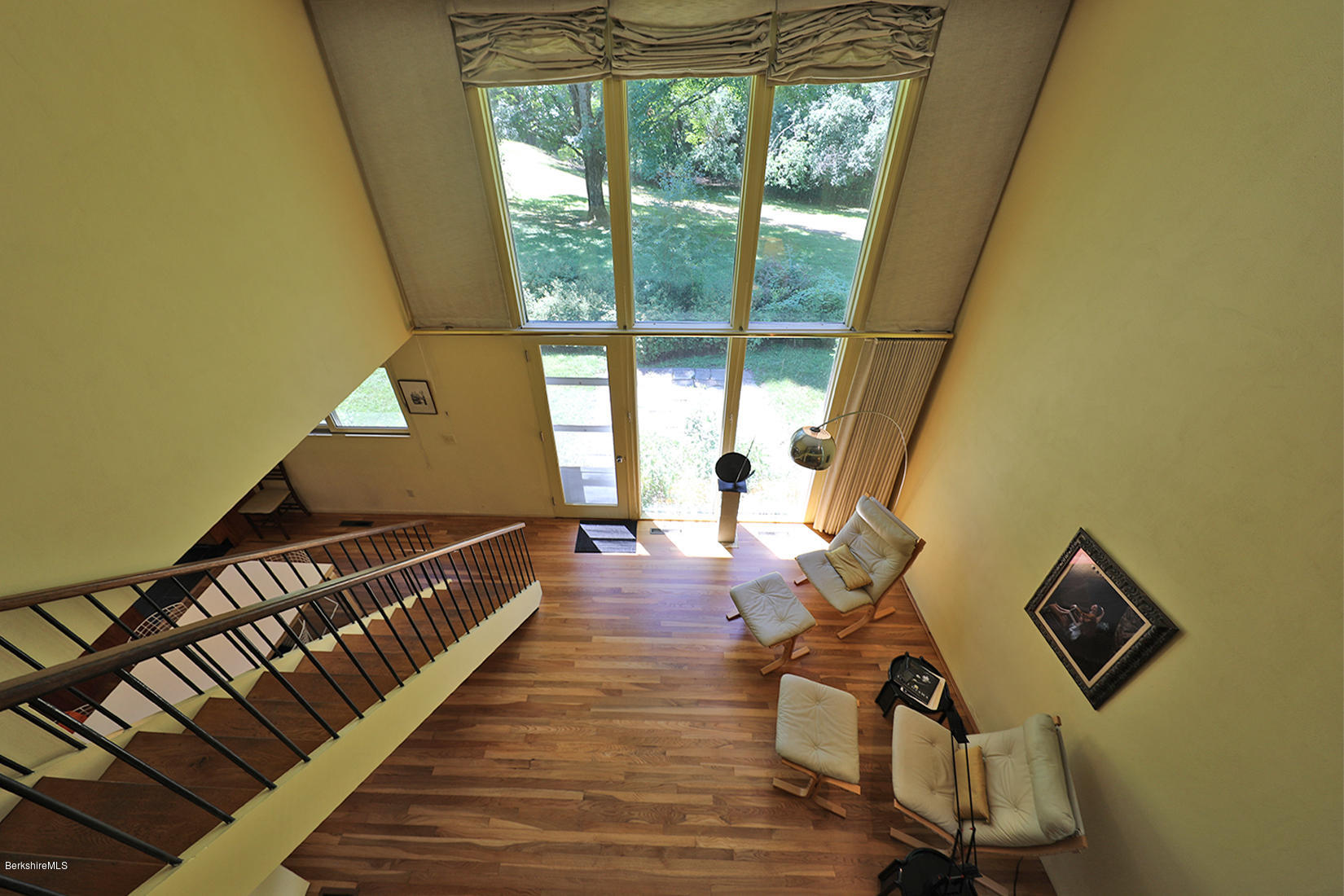 13 Hill Road Stockbridge, MA 01262 - Photo 18 of 27 a bedroom with wooden floor bed and a window