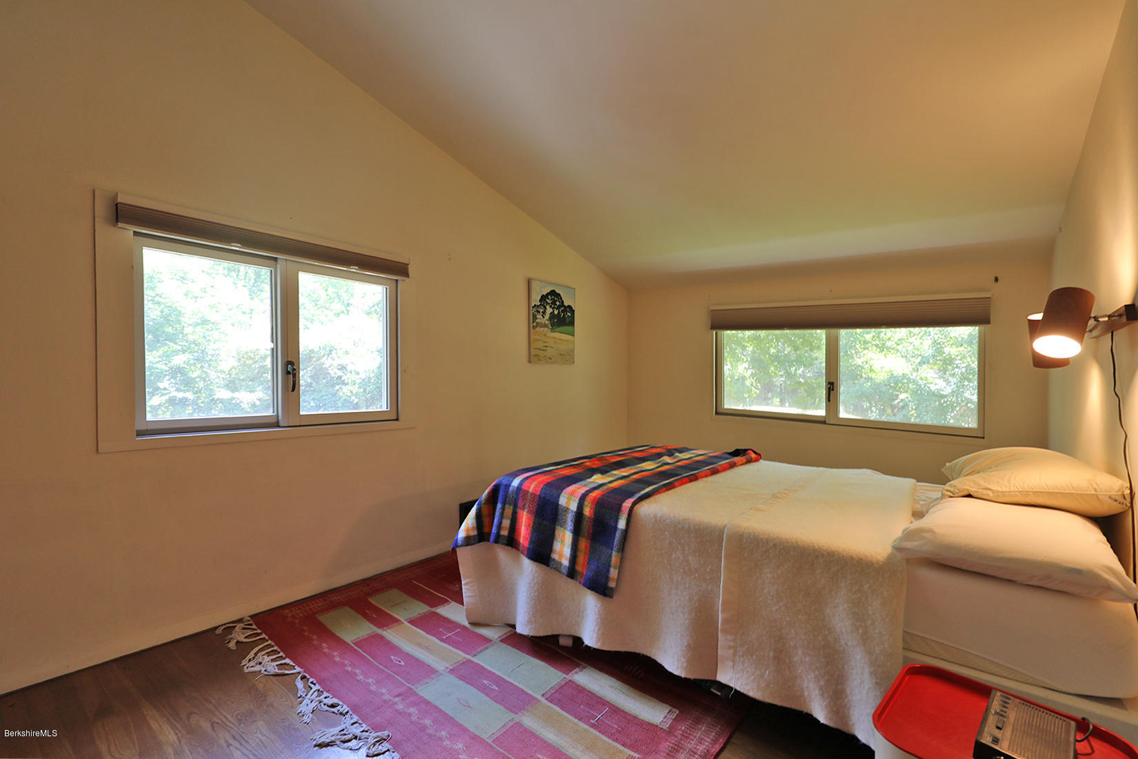 13 Hill Road Stockbridge, MA 01262 - Photo 22 of 27 a bed sitting in a bedroom next to a window