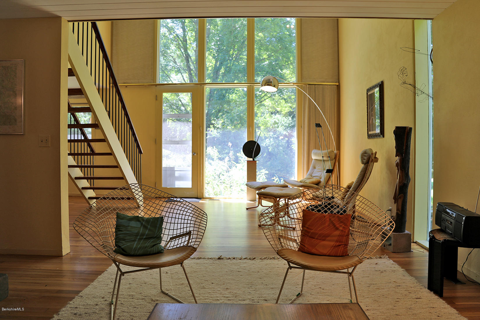 13 Hill Road Stockbridge, MA 01262 - Photo 7 of 27 a living room with furniture and a floor to ceiling window