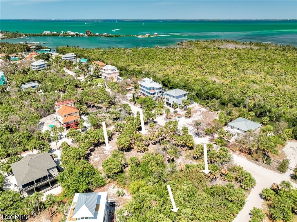 4430 Conch Shell Drive Upper Captiva, FL 33924 - Photo 28 of 32 a view of a lake with a city