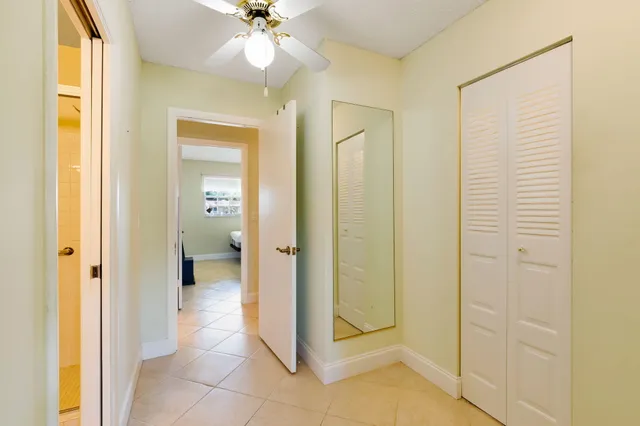 a view of a bathroom with a glass door shower