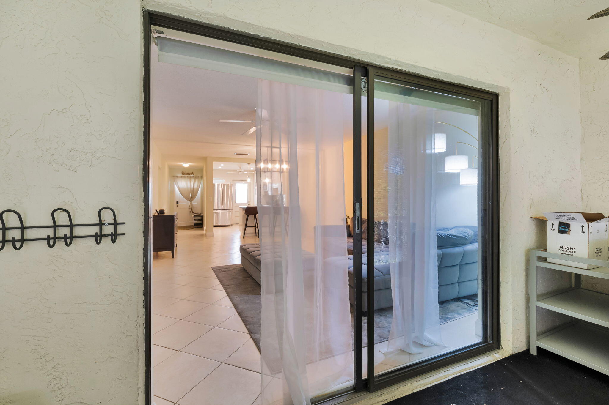 1700 Dover Road, Unit 204A Delray Beach, FL 33445 - Photo 27 of 33 a view of a bathroom with a glass door shower