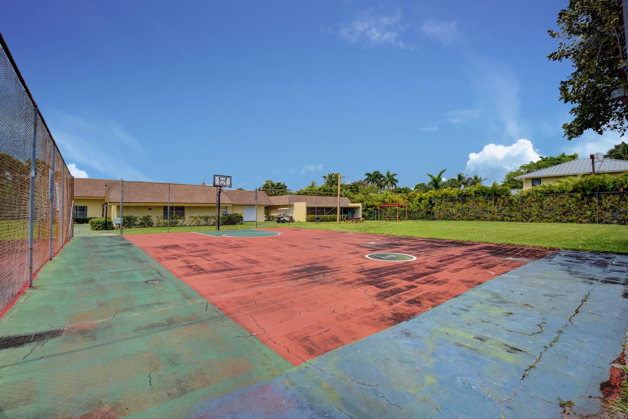 1700 Dover Road, Unit 204A Delray Beach, FL 33445 - Photo 30 of 33 a view of a tennis court