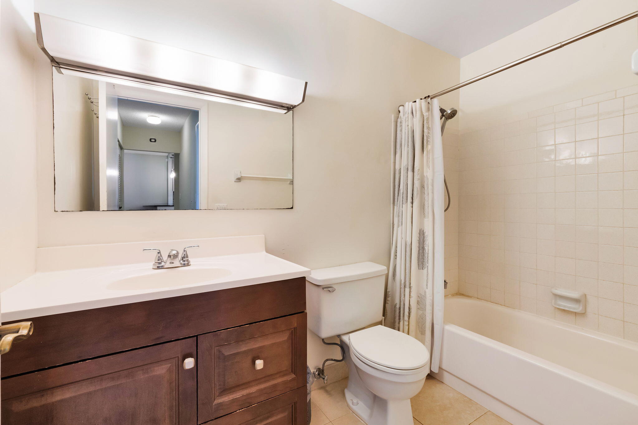 1700 Dover Road, Unit 204A Delray Beach, FL 33445 - Photo 10 of 33 a bathroom with a sink toilet and shower