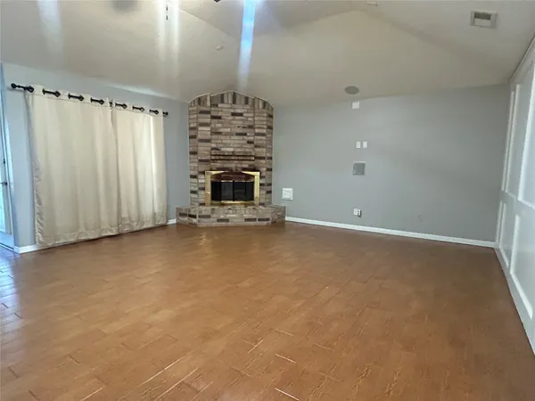 a view of a livingroom with a fireplace