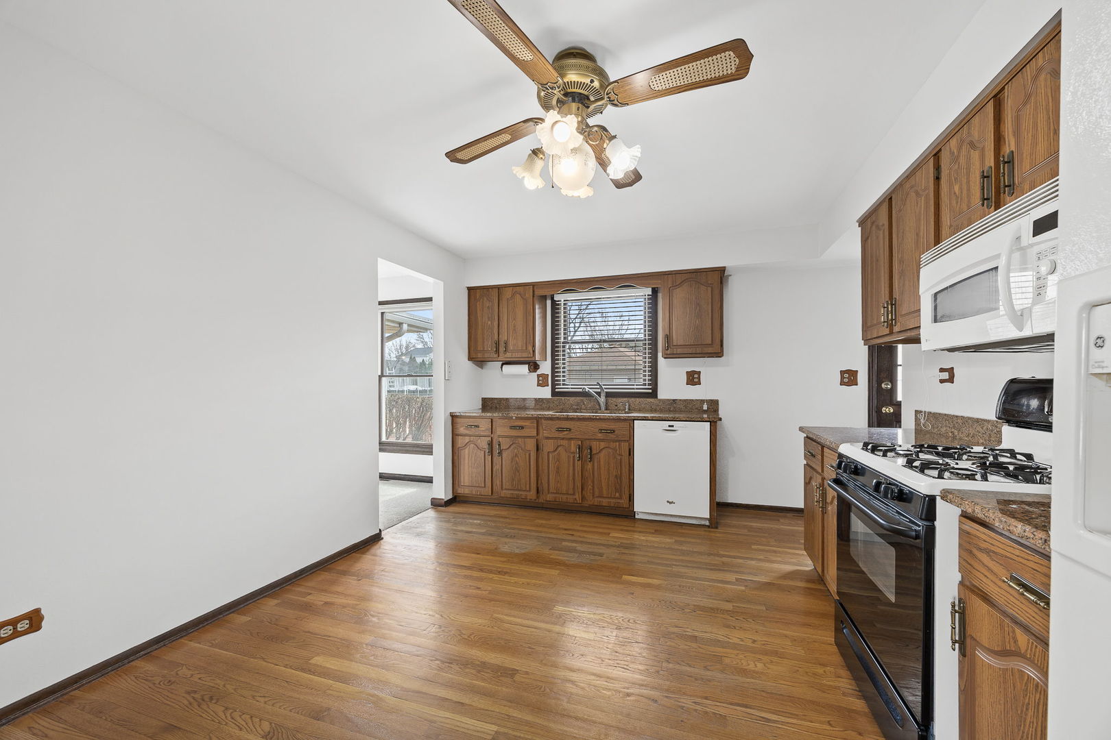 494 Flint Trail Carol Stream, IL 60188 - Photo 13 of 37 a kitchen with stainless steel appliances a stove a sink dishwasher and a refrigerator