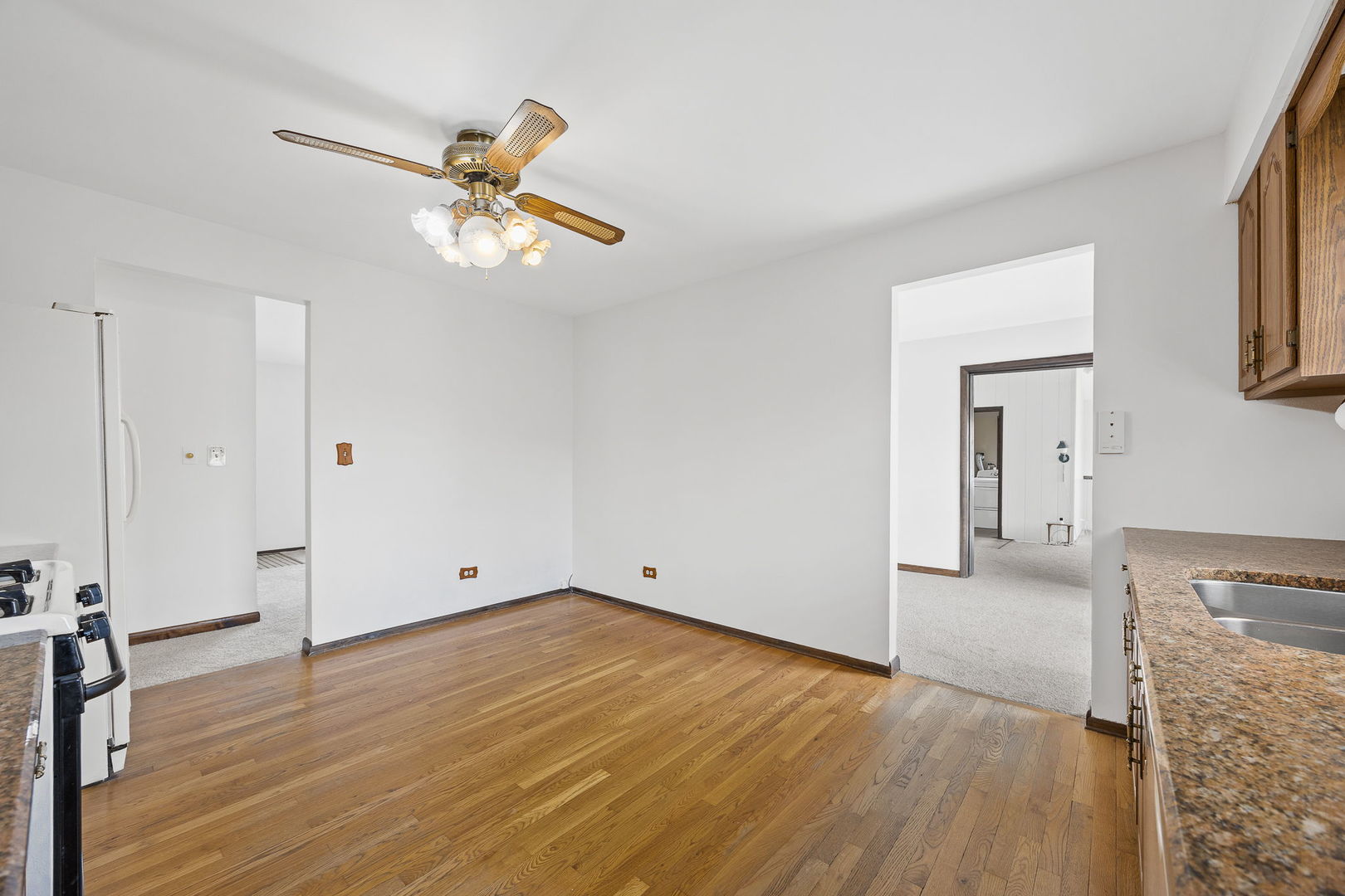 494 Flint Trail Carol Stream, IL 60188 - Photo 14 of 37 wooden floor in an empty room with a window