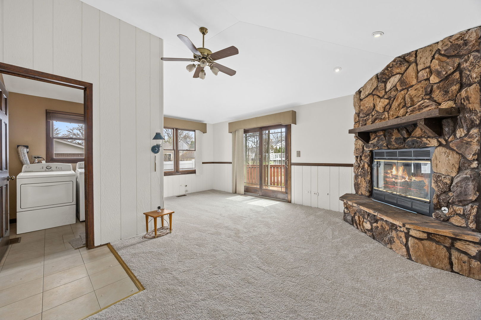 494 Flint Trail Carol Stream, IL 60188 - Photo 18 of 37 a view of a livingroom with furniture and a ceiling fan