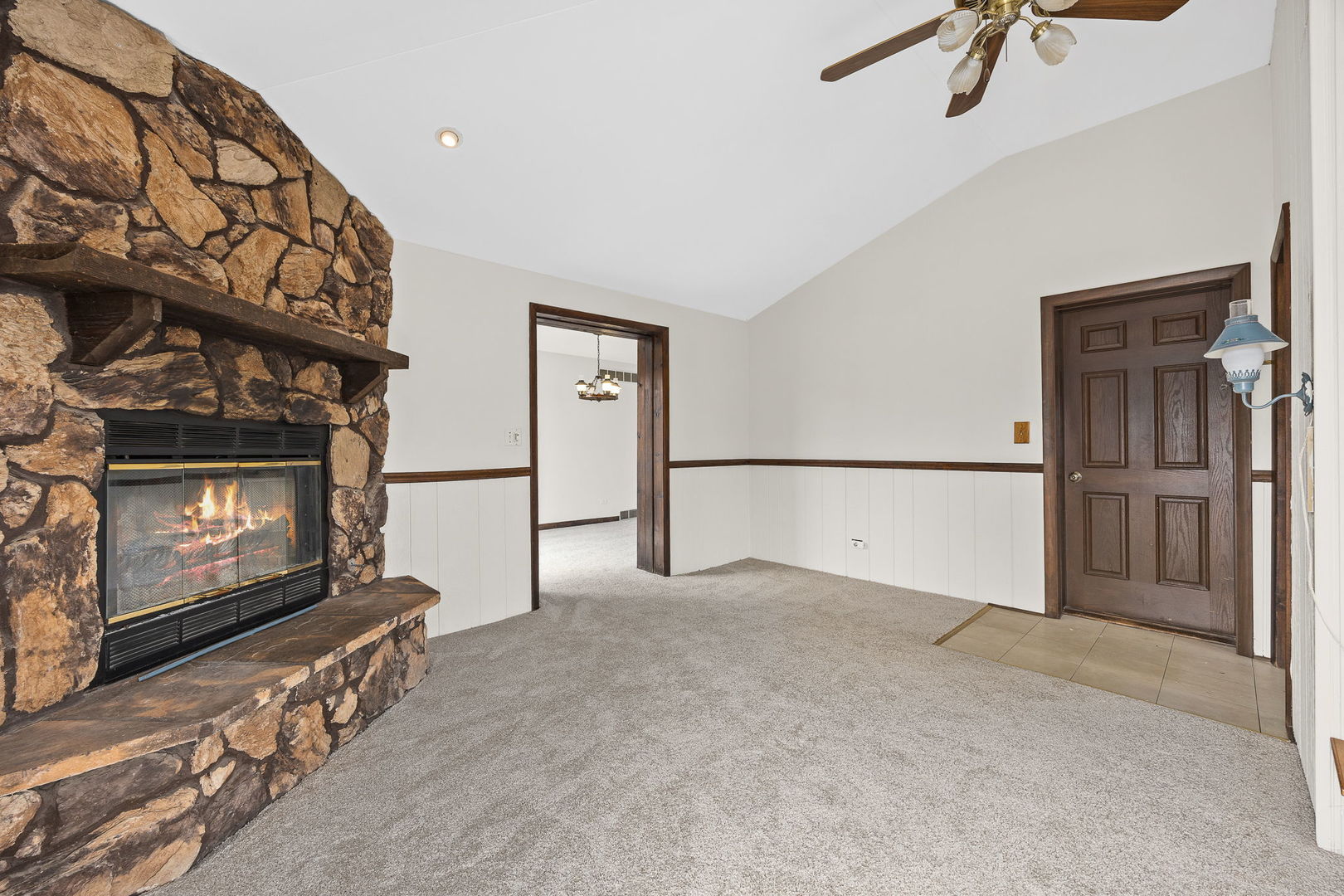 494 Flint Trail Carol Stream, IL 60188 - Photo 20 of 37 a view of empty room with fireplace and fan