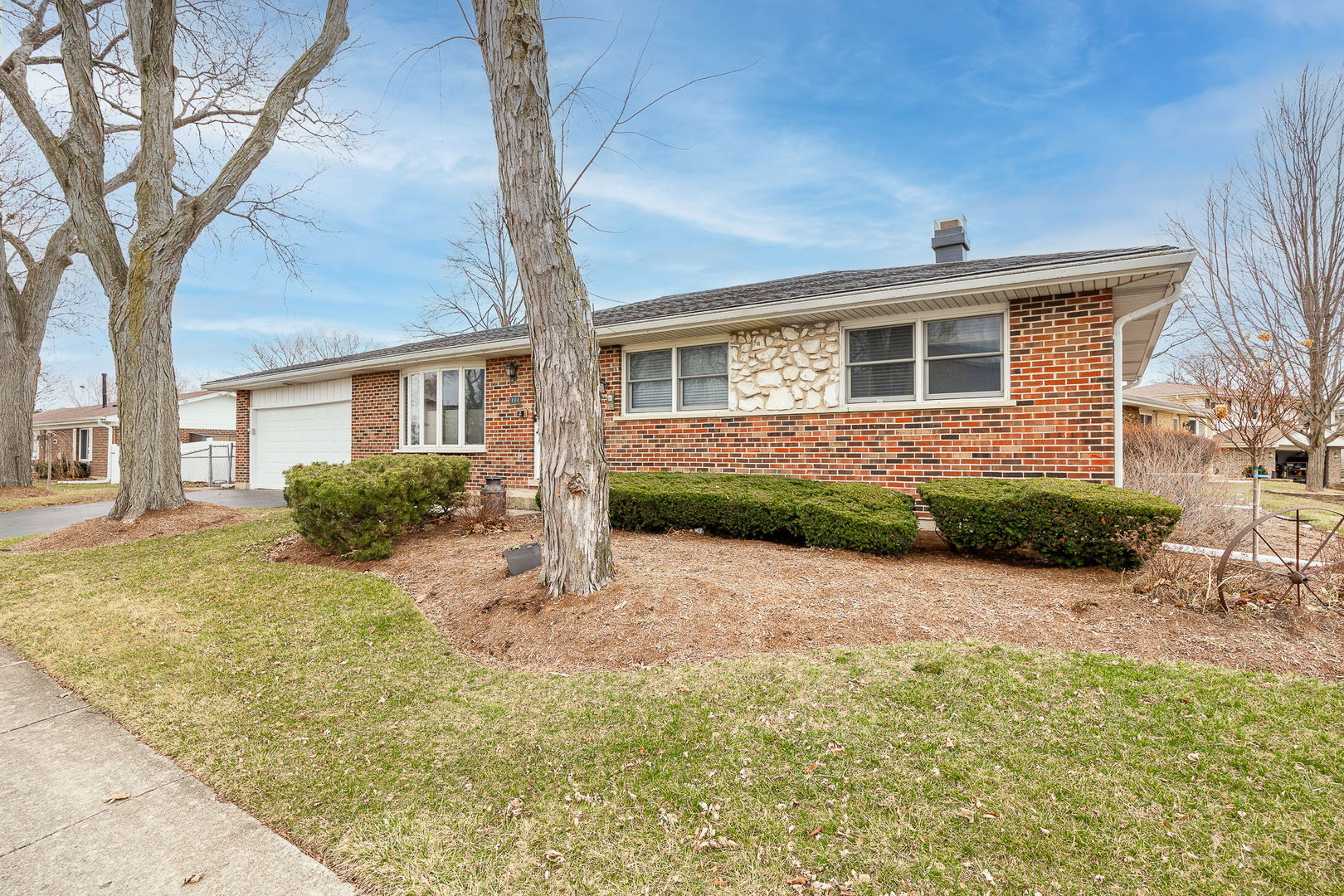 494 Flint Trail Carol Stream, IL 60188 - Photo 2 of 37 a front view of a house with a yard