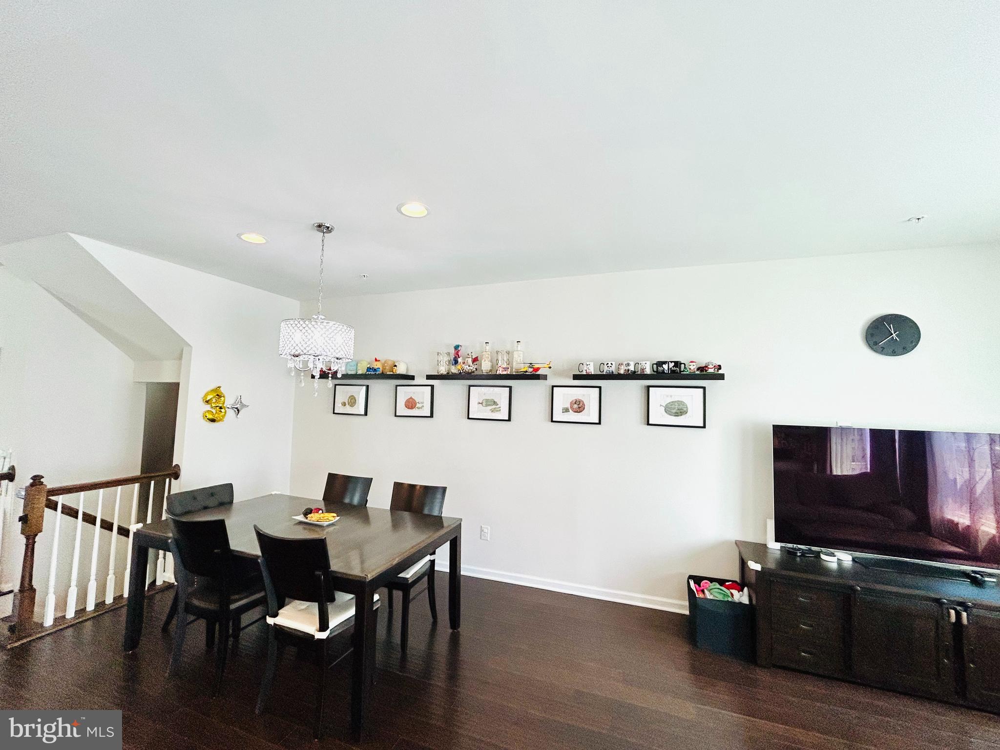 113 Patriots Path Malvern, PA 19355 - Photo 13 of 24 a view of a dining room with furniture and wooden floor