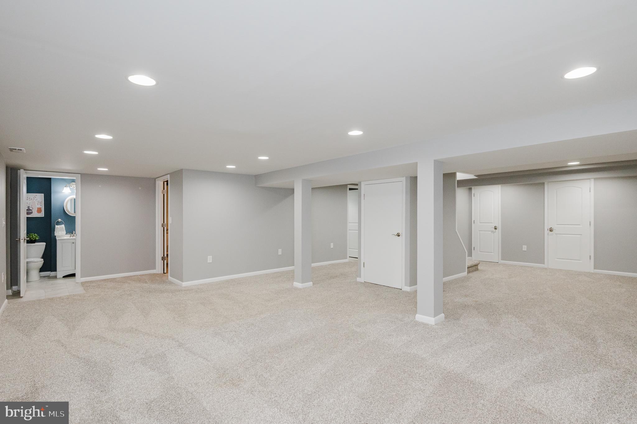 8810 Alnwick Road Baltimore, MD 21234 - Photo 11 of 47 Lower Level Rec Room with Exit