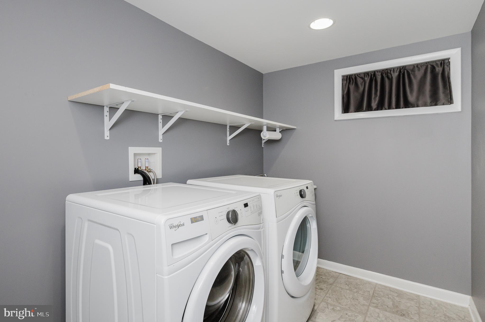 8810 Alnwick Road Baltimore, MD 21234 - Photo 39 of 47 Large Laundry Room with Sink & Shelves