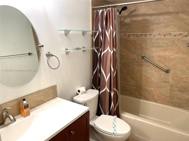 a living room with a table and chair