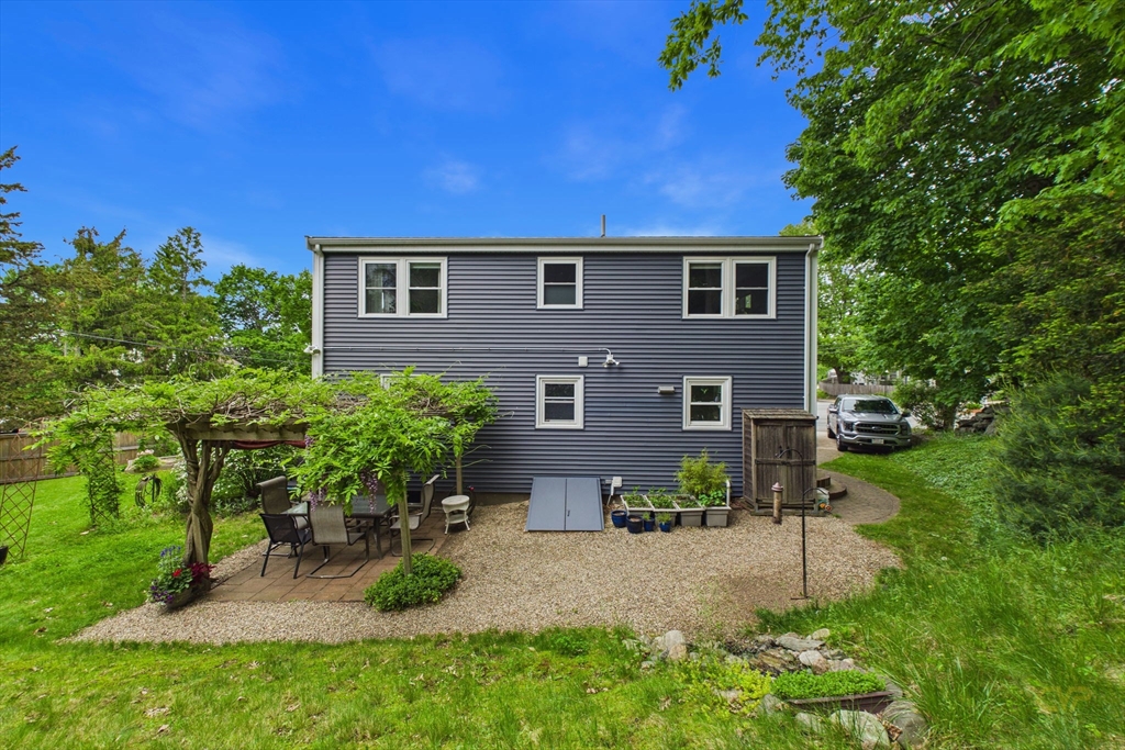 70 Neponset Street Canton, MA 02021 - Photo 39 of 39 a view of a house with a yard and sitting area