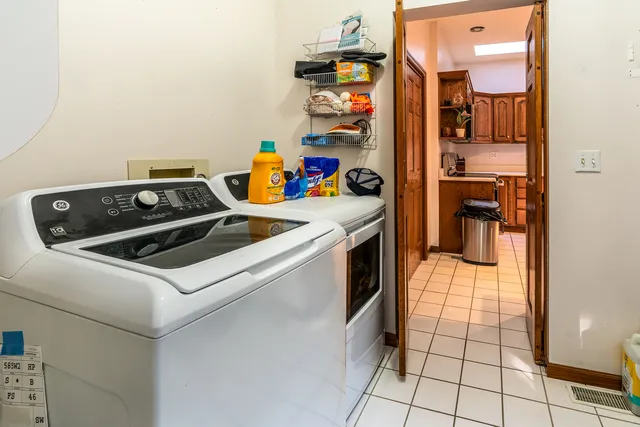 a kitchen that has a stove and a microwave