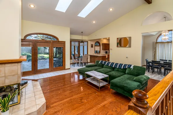 a living room with furniture and a large window