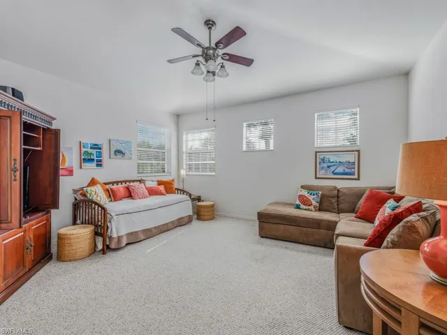 a bedroom with furniture and a bed