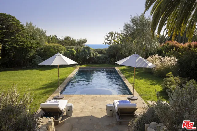 a view of yard with furniture