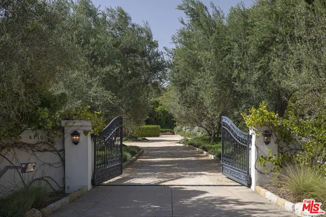 a view of street along with trees