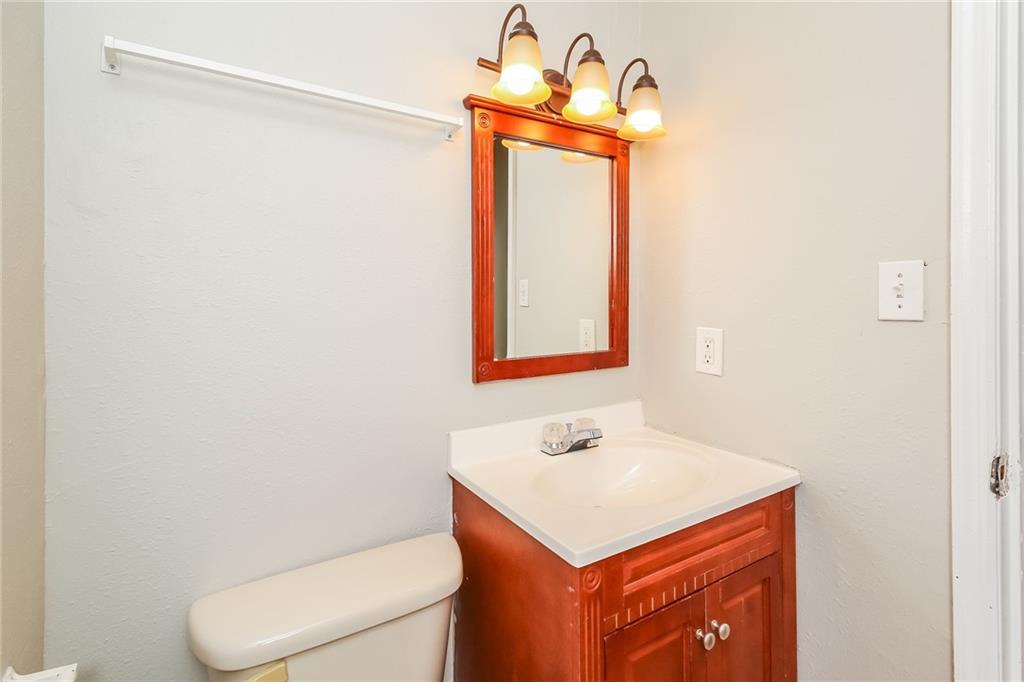 4033 Emerald N Circle Decatur, GA 30035 - Photo 16 of 25 a bathroom with a sink and a toilet